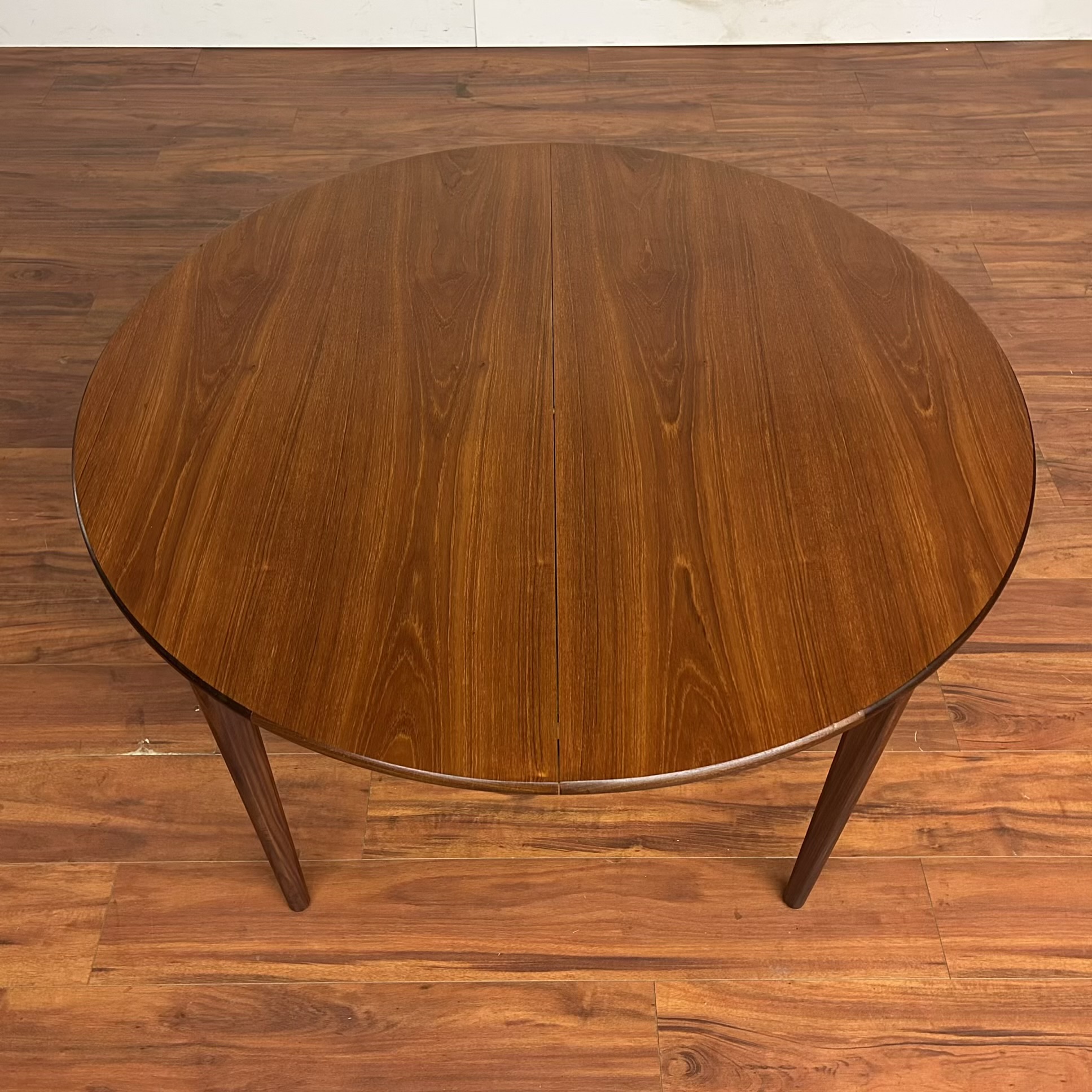 Mid-Century Teak Butterfly Leaf Dining Table – $1250
